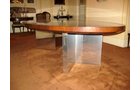 Dunbar Dining or Conference Table Mid to late 70s Designed by Roger Lee Sprunger, a protege of Edward Wormley An iconic piece wth high mirrored pristine finish of Brazilian Rosewood with Mahogany banned edges.  Polished Chrome Planks â€“ Plinths V shaped bases and middle secret drawer with Brass Dunbar tag.  Oval in shape and measuring 110 in. x 60 in.     - Extraordinary Auction - Nike Spillson Home Interiors & Furnishings